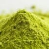 A vibrant, close-up photograph of a mound of barley green powder, meticulously captured with a macro lens. The powder appears lush and velvety, with an inviting, vivid green hue that evokes the verdant, nutrient-rich essence of the barley plant. The lighting is soft and diffused, accentuating the powder's natural luminescence and highlighting its fine, powdery texture. The composition places the powder at the center, filling the frame and drawing the viewer's eye to its soothing, earthy tones. The overall mood is one of natural health and wellness, reflecting the restorative properties of this versatile superfood.